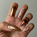 Premium nail design example https://ai-baby-generator-cdn-hkezgqbvgub5cwd5.z01.azurefd.net/ai-baby-generator-static/nail-art/static-website/premium-5.png
